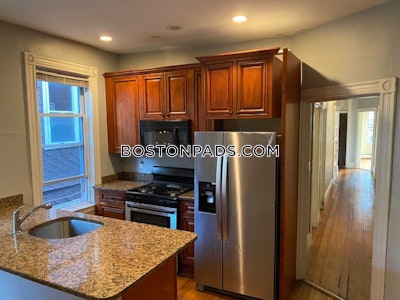 Mission Hill Large 5 bedroom 2 bath with hardwood floors, eat-in kitchen, deck, washer and dryer in unit Boston - $7,500